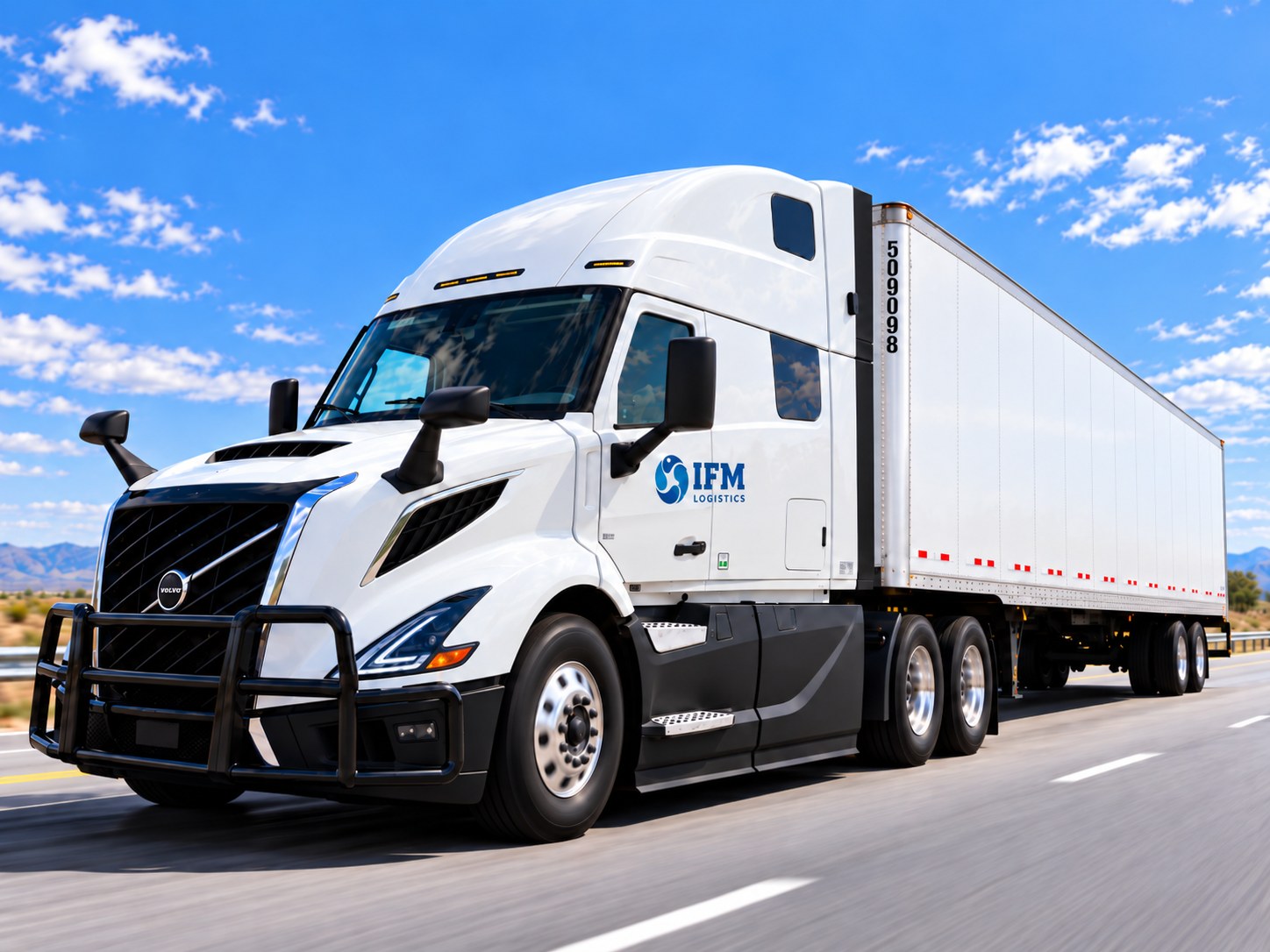 White IFM Logistics Volvo VNL tractor with a dry van trailer on an open highway